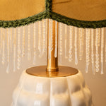 Load image into Gallery viewer, Close-up of beaded fringe and brass lamp fitting