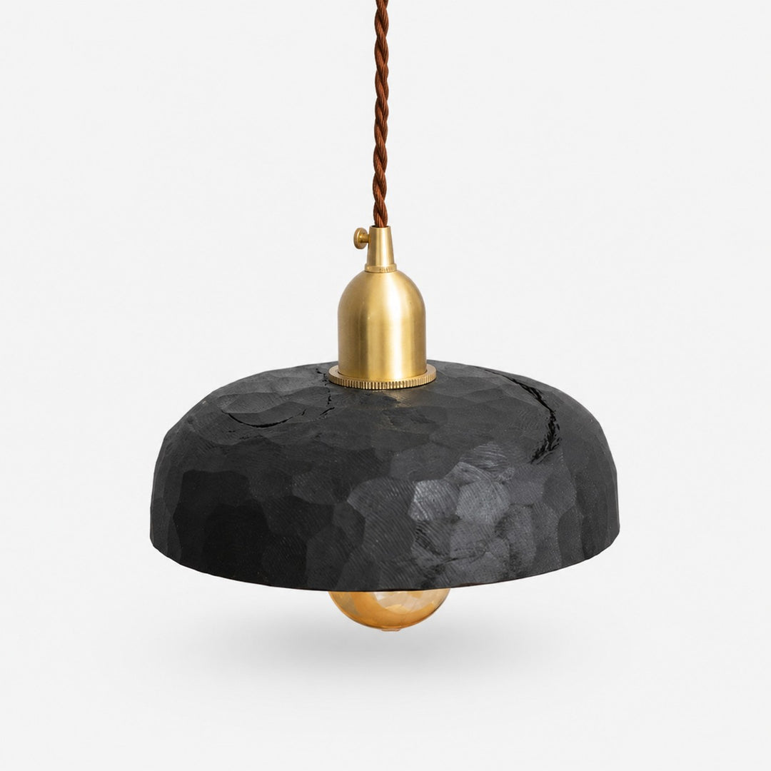 Black carved wood pendant lamp on a clean background
