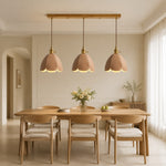 Load image into Gallery viewer, Three natural leather pendant lights in a light dining room