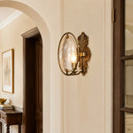Load image into Gallery viewer, Antique brass glass wall sconce installed in a hallway