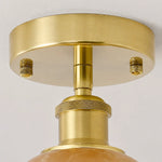 Bild in Gallery-Viewer laden, Brass-toned canopy and fitting detail