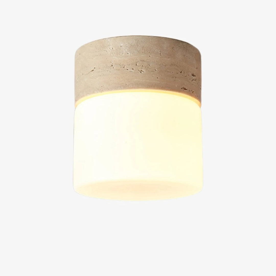 Ivory travertine flush mount ceiling light with warm glass shade