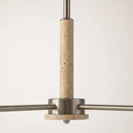 Load image into Gallery viewer, Close view of the travertine center column and metal arms