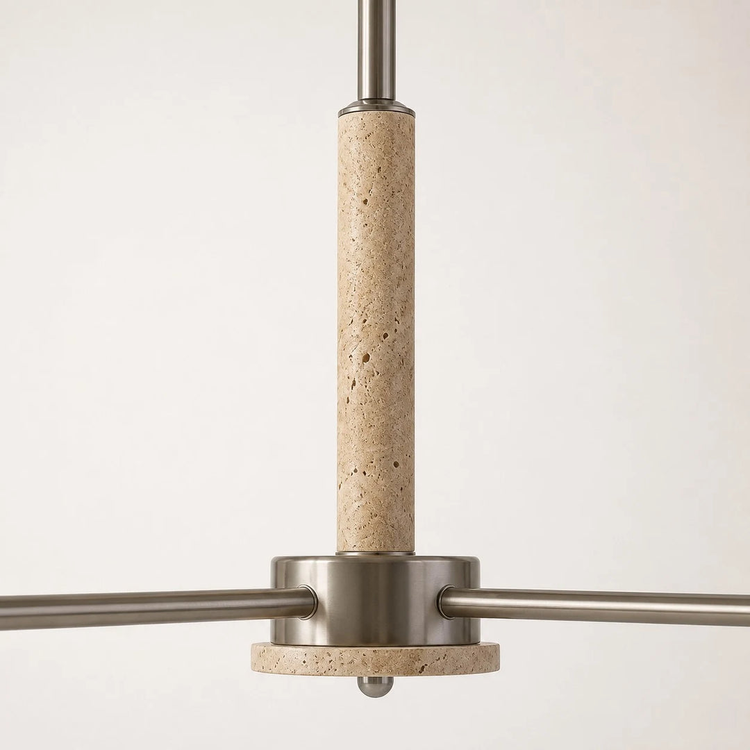 Close view of the travertine center column and metal arms
