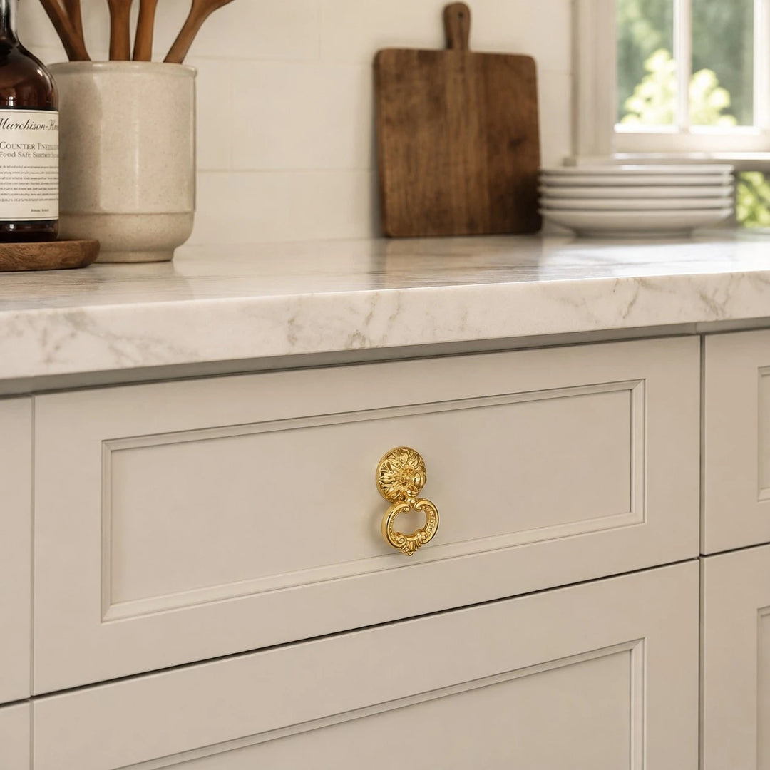 Brass ring pull on a kitchen drawer
