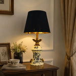 Load image into Gallery viewer, Blue porcelain motif table lamp on a classic side table