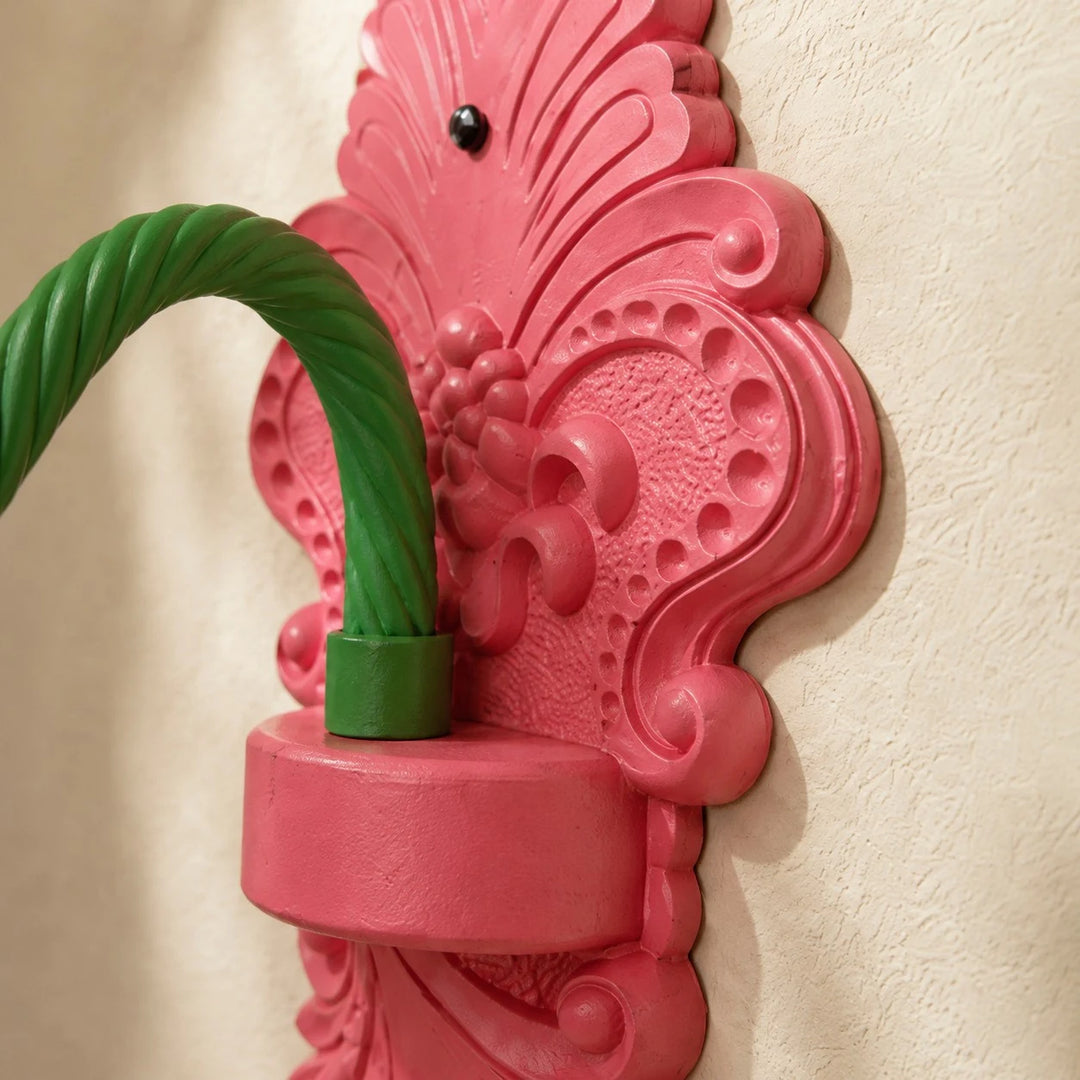 close view of sculpted backplate and curved green arm