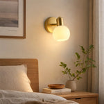 Load image into Gallery viewer, Single-light wall sconce beside a bed
