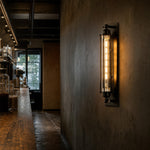 Load image into Gallery viewer, Industrial tube wall sconce installed on a corridor wall