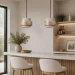 Cargar imagen en el visor de la Galería, Travertine pendant lamps above a calm dining bar