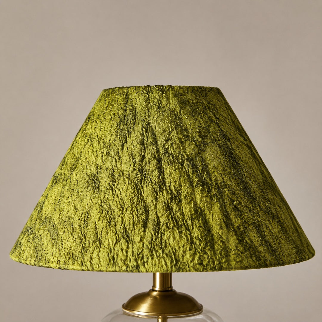 Close view of the green textured fabric lampshade