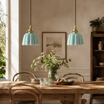 Bild in Gallery-Viewer laden, Pair of ceramic lotus pendant lights over a dining table
