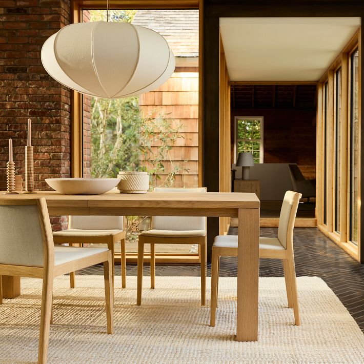 Lámpara colgante Alvian: pantalla de lino con altura ajustable para un comedor acogedor