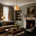 Charger l'image dans la visionneuse de galerie, Ivory woven globe pendant illuminating a traditional sitting room