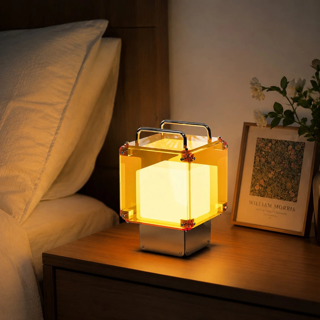 Rechargeable table lamp used on a bedside table