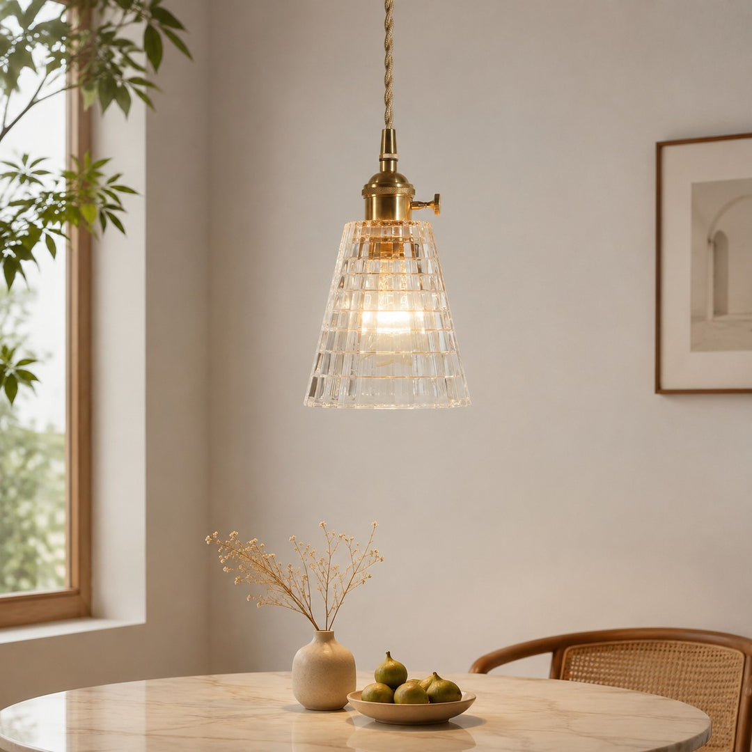 Style E geometric glass pendant above a wooden dining table