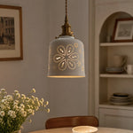 Cargar imagen en el visor de la Galería, Floral ceramic pendant light in a cozy interior corner