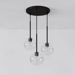 Cargar imagen en el visor de la Galería, Lámpara de araña minimalista de cristal Selvion: luminaria escultural de vidrio artesanal
