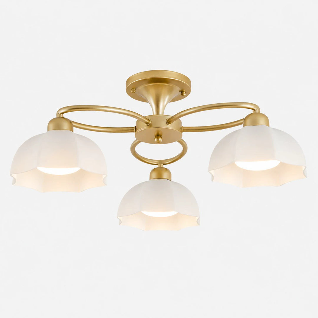 3-light brass ceiling fixture with white glass shades