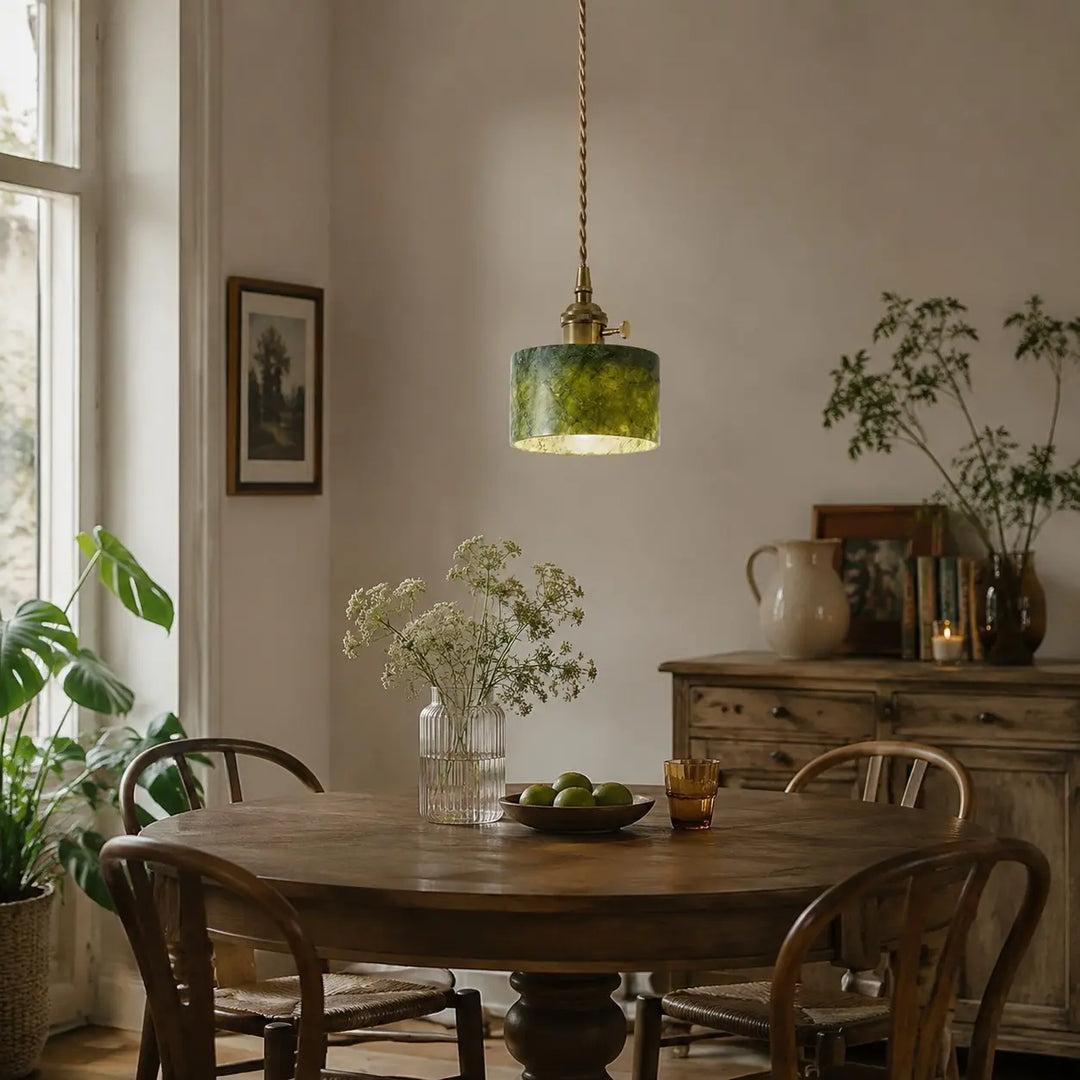 Jade pendant with switch in a rustic dining room