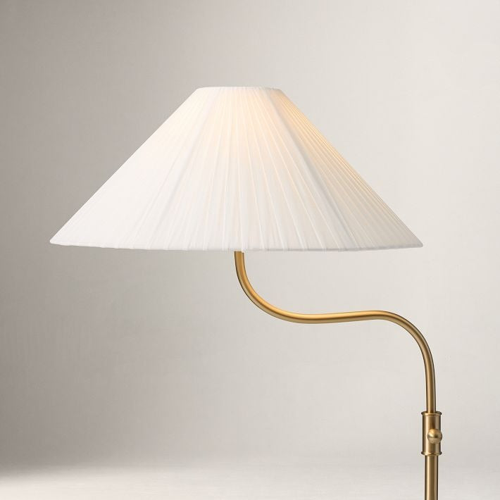 Lámpara de pie elegante Fibura con pantalla de lino en bronce champán: añade calidez