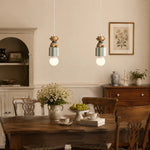Cargar imagen en el visor de la Galería, Animal gift box pendant lamps above a dining table