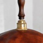 Load image into Gallery viewer, brass socket and distressed leather shade detail