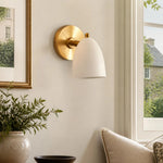 Charger l'image dans la visionneuse de galerie, White and gold wall sconce near a window seating area