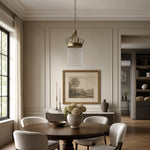 Cargar imagen en el visor de la Galería, Clear crystal pendant light in a refined neutral dining room