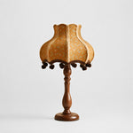 Bild in Gallery-Viewer laden, Vintage floral fabric table lamp with turned brown base on white background
