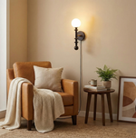 Load image into Gallery viewer, Walnut Stem and Glass Globe Plug-In Wall Lamp room scene 8