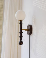 Load image into Gallery viewer, Walnut Stem and Glass Globe Plug-In Wall Lamp product view 3