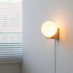 Load image into Gallery viewer, Evelyn Wood Orb Plug-In Wall Light - product image 3