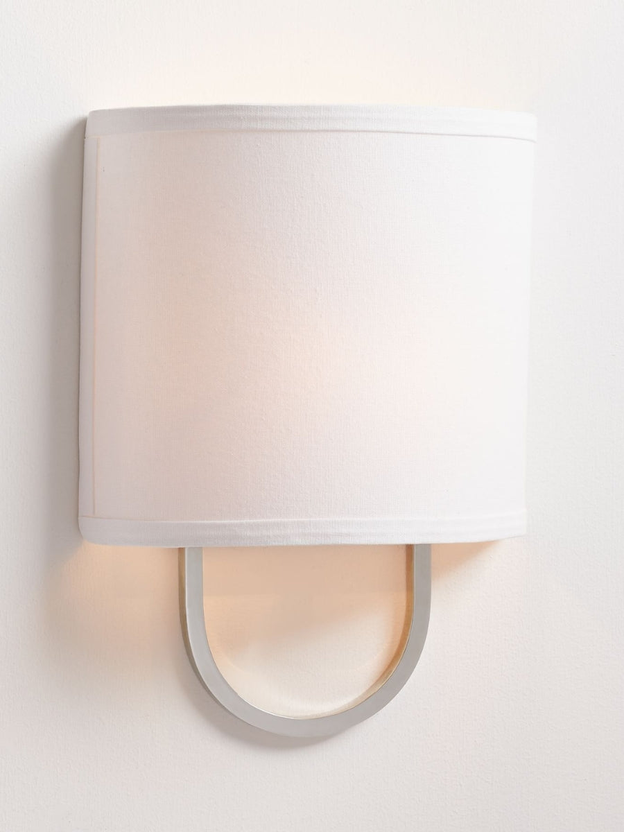 Lámpara de pared con pantalla de tela: aplique moderno para dormitorio con una iluminación acogedora 