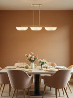 Load image into Gallery viewer, Ferosa Brass Glass Linear Chandelier – 3 Light Milk Glass Dining Lighting
