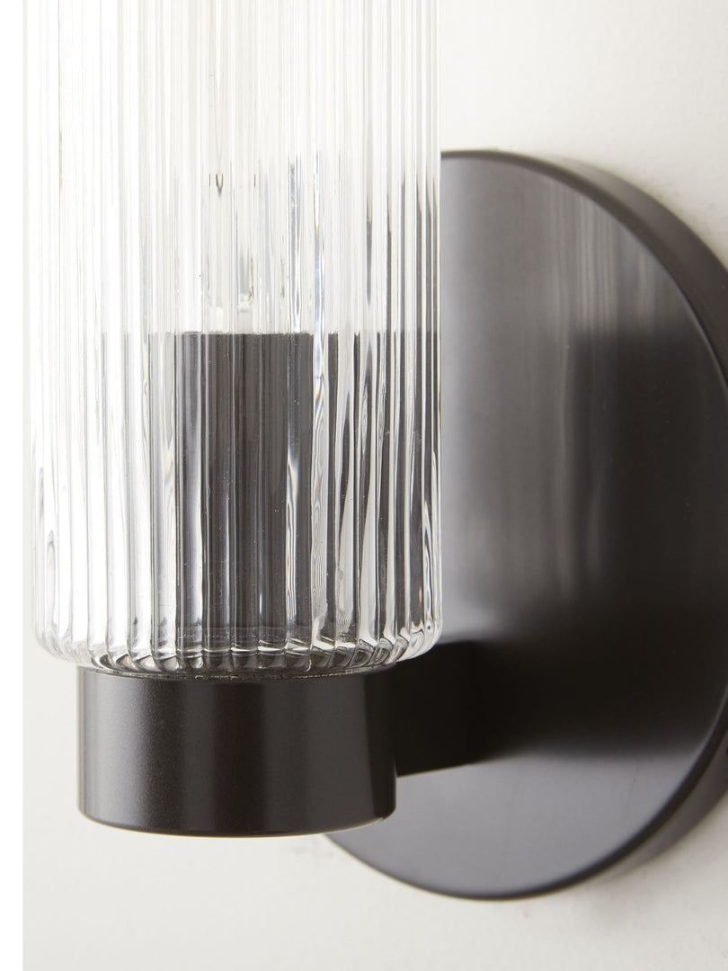 Aplique de pared moderno Rivora de vidrio estriado para interiores y exteriores. Ideal para la decoración del hogar.