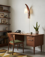 Cargar imagen en el visor de la Galería, Curved walnut and frosted glass plug-in wall lamp on a console wall