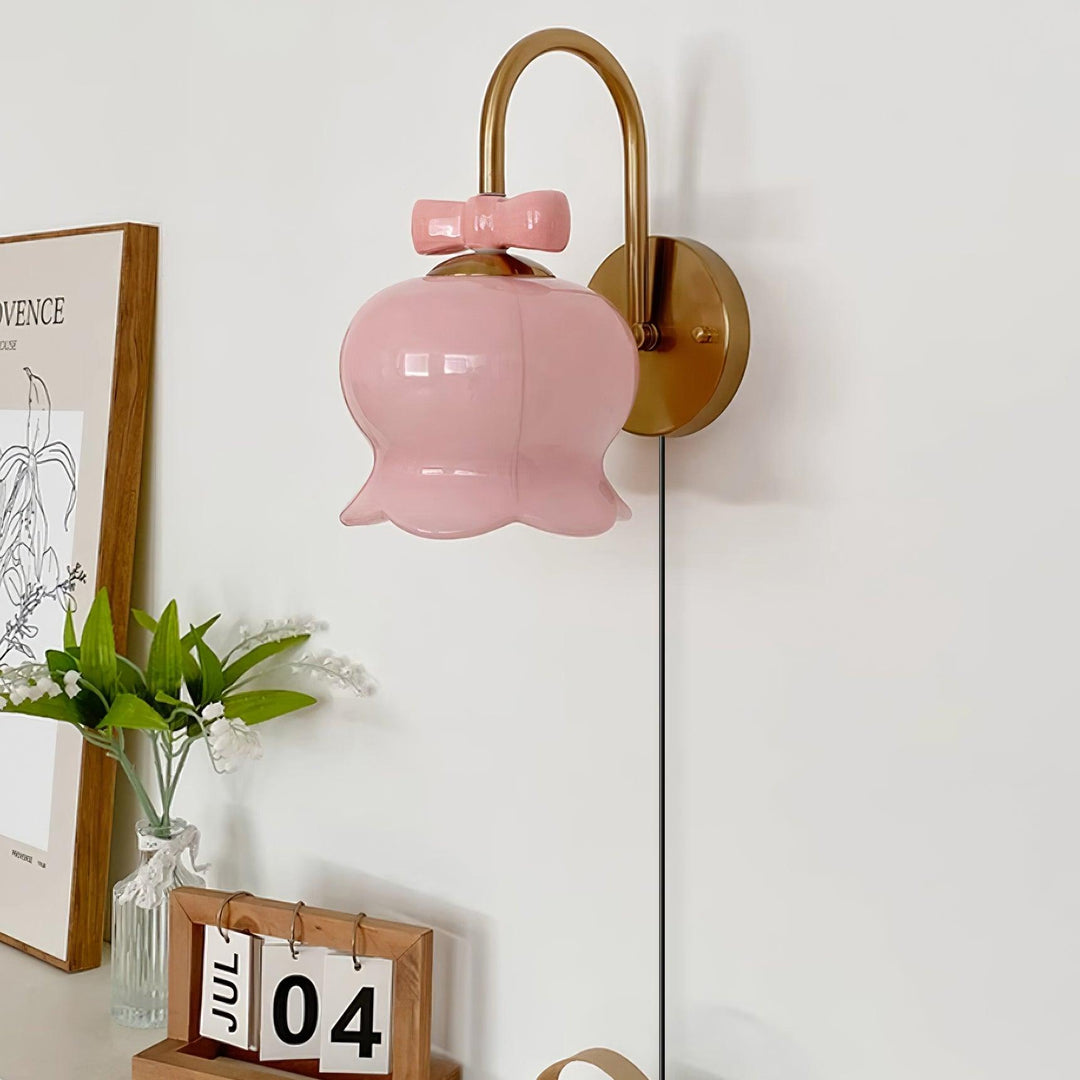 Bow-Topped Glass Bell Plug-In Wall Sconce room scene 3