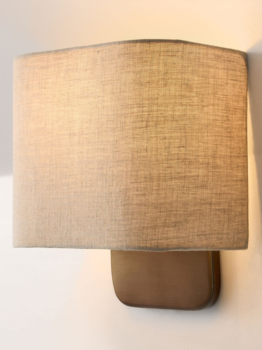 Aplique de tela: iluminación de pared minimalista con un brillo cálido para el dormitorio 