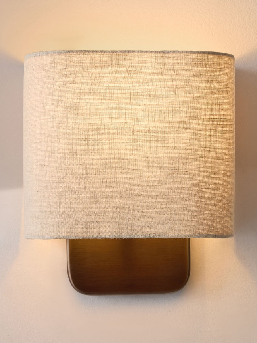 Aplique de tela: iluminación de pared minimalista con un brillo cálido para el dormitorio 