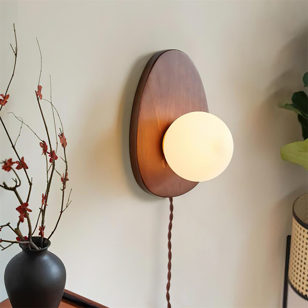 Oval Walnut and Frosted Glass Plug-In Wall Lamp room scene 2
