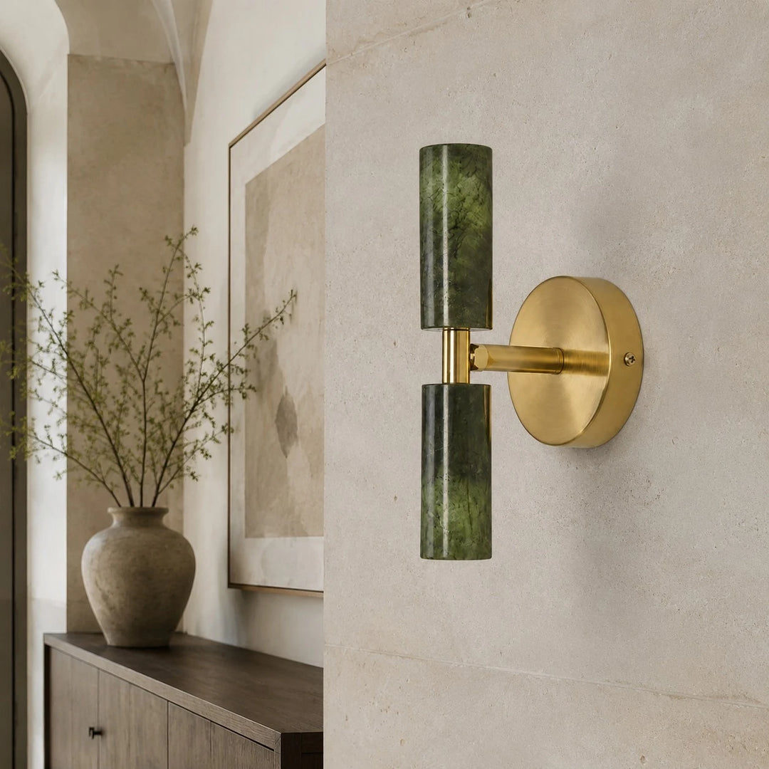 Natural green jade wall sconce installed in a hallway setting