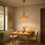 Cargar imagen en el visor de la Galería, Amber pendant light above a dining table