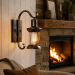 Bild in Gallery-Viewer laden, Antique bronze wall lantern used as warm indoor wall accent