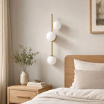 Load image into Gallery viewer, Wall sconce adding warm architectural character to a room