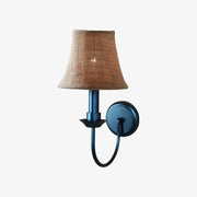 Matte black wall sconce with A linen shade