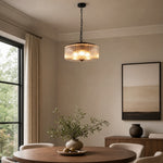 Load image into Gallery viewer, Black ribbed glass pendant ceiling lamp above a dining table