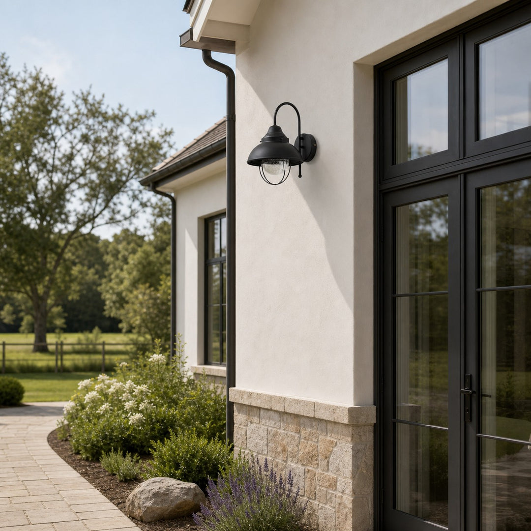 Black seeded-glass wall lamp on a bright architectural wall