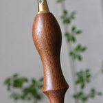 Charger l'image dans la visionneuse de galerie, Close-up of walnut wood accent on pendant cord