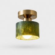 jade and gold ceiling light on gray background